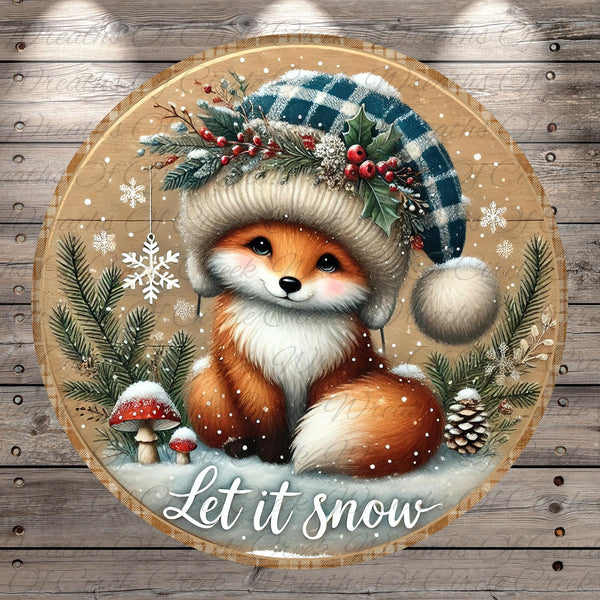 A cheerful fox wearing a plaid hat and surrounded by snow, pine trees, and mushrooms, with the text "Let it snow" below the image.