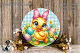 A cheerful yellow duck surrounded by colorful Easter eggs and flowers, with a bow on its head, set against a rustic wooden background.