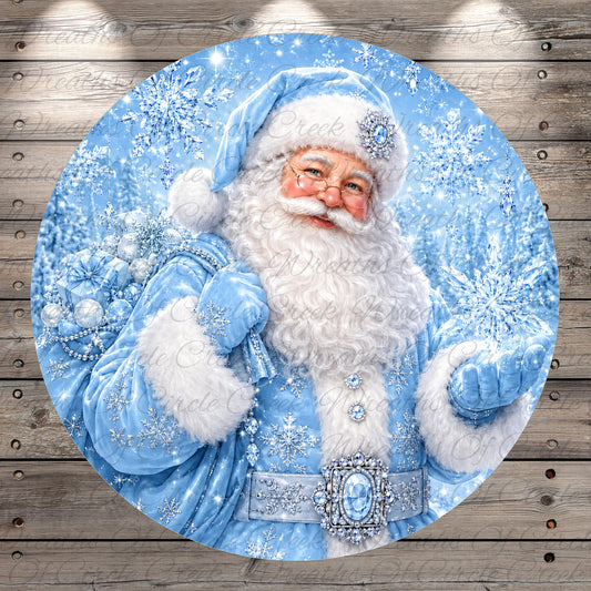 A round, blue-colored illustration of Santa Claus wearing a blue suit and hat, holding a bag of presents, with snowflakes falling around him.