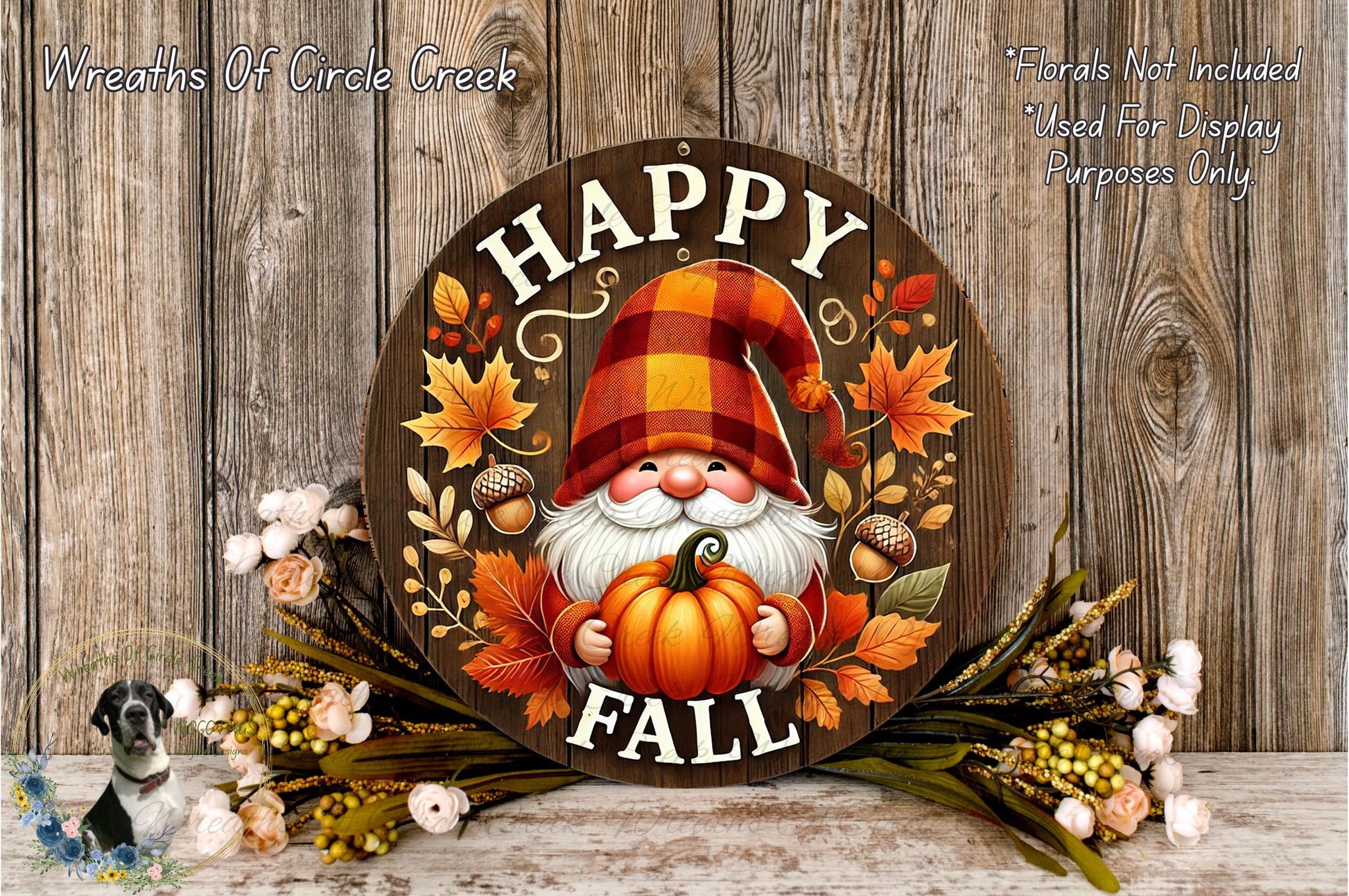 a happy fall sign with a gnome holding a pumpkin