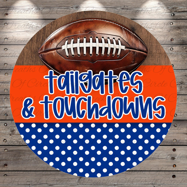 A football is displayed on a wooden surface, with the text "tailgates & touchdowns" written in a playful, casual font.