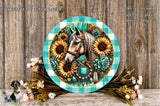 a decorative round sign with a horse and sunflowers, surrounded by flowers and placed on a wooden surface.