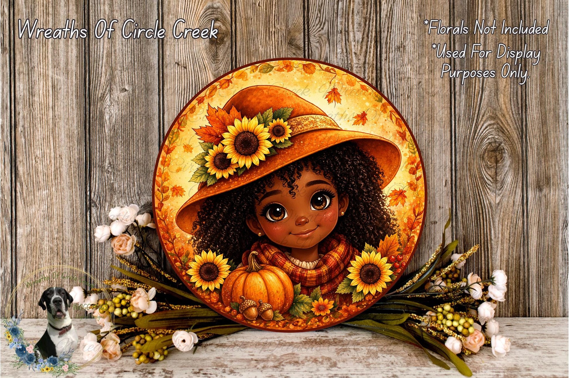 A round, decorative wreath featuring a young girl with curly hair and a sunflower hat, surrounded by autumn foliage and flowers.