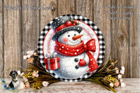 A snowman wearing a red scarf and hat, holding a red gift box, is surrounded by a wreath of flowers and a wooden background.