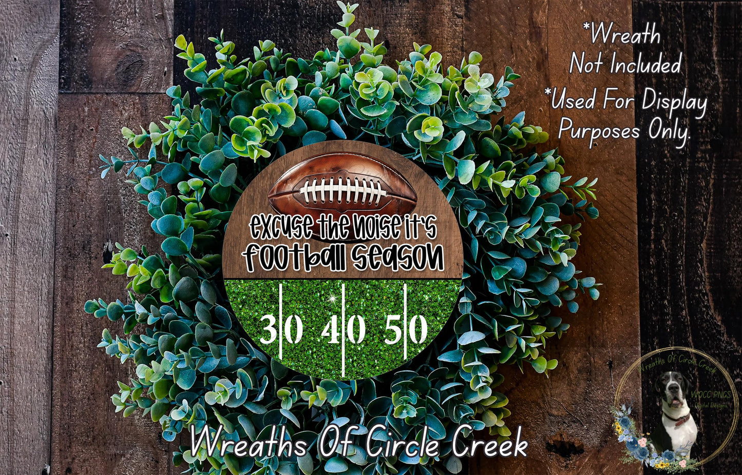 a wreath made of green foliage and a football, with text and numbers displayed on it.
