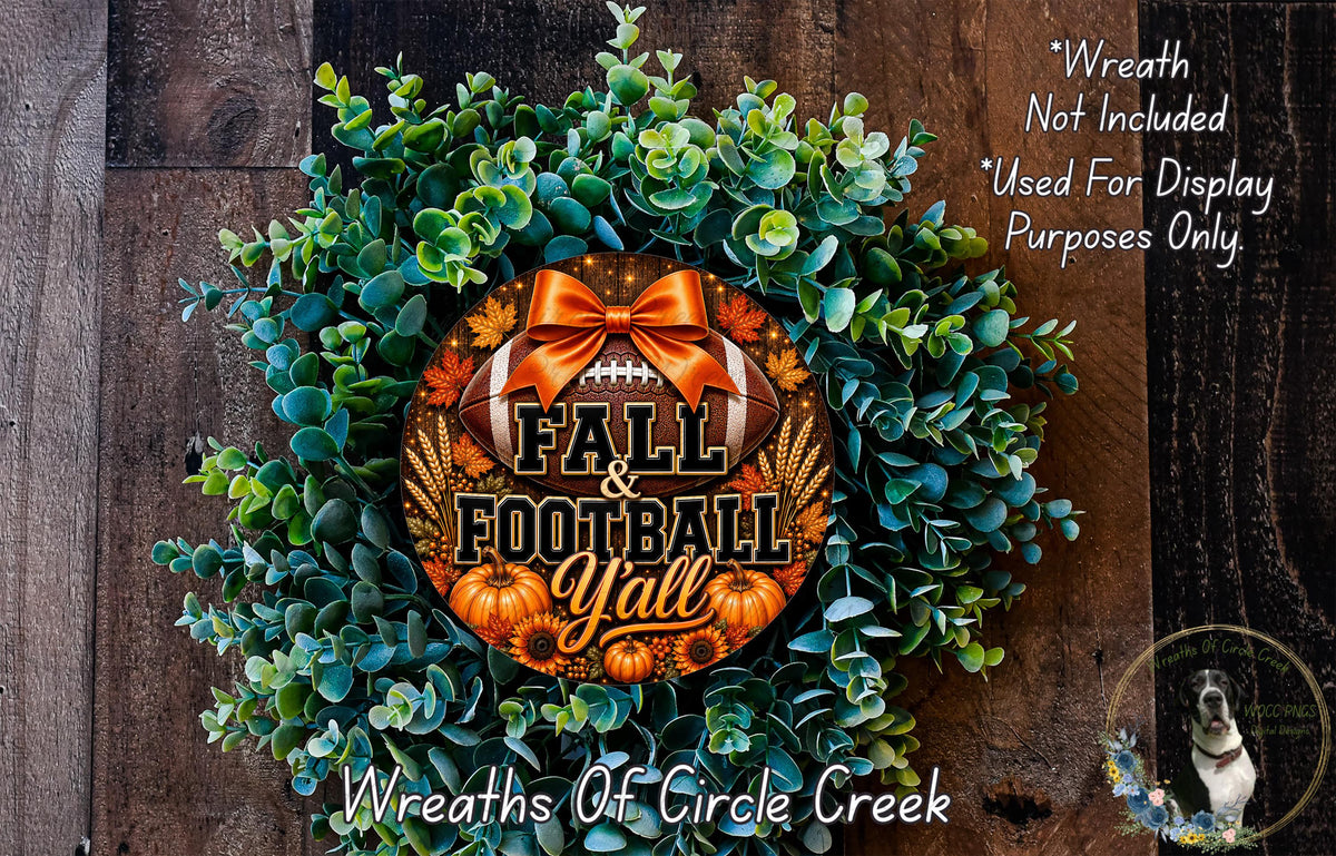 a wreath made of various fall-themed elements, including a football, pumpkins, and greenery. The wreath is displayed on a wooden surface, and there is a text overlay that reads "Fall & Football Yell" and "Wreaths of Circle Creek".