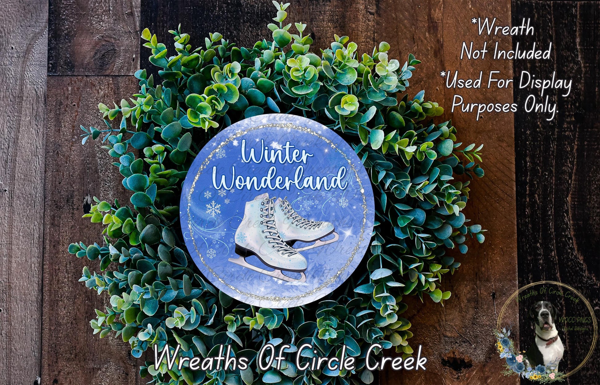 A wreath made of green leaves and a pair of white skis, with the text "Winter Wonderland" and "Wreaths of Circle Creek" displayed on it.