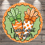 a round, decorative sign with a carrot and a bow, surrounded by a polka dot border. The sign has a humorous Easter-themed message that reads "I carrot wait for Easter".