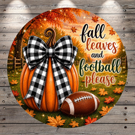 A decorative pumpkin with a bow, surrounded by autumn leaves and a football, with the text "fall leaves and football please" written on it.