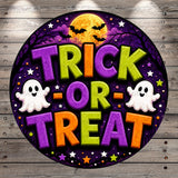 a Halloween-themed design with the text "TRICK OR TREAT" prominently displayed in the center. The background is a dark purple color, with a full moon, bats, and stars scattered throughout. There are also two ghostly figures, one on each side of the text, adding to the spooky atmosphere.