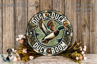 A decorative sign featuring a duck in mid-flight, surrounded by flowers and foliage, with the text "Duck, Duck, Boom" prominently displayed.