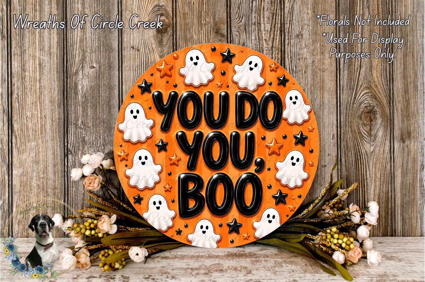 a Halloween-themed sign with the text "YOU DO YOU BOO" surrounded by ghost decorations and flowers.
