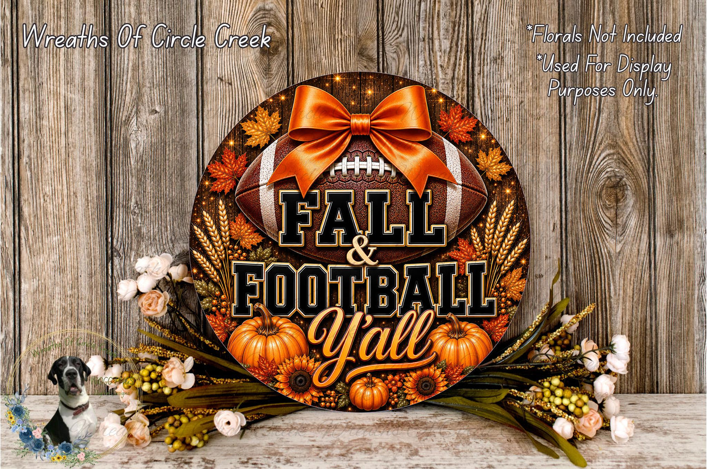 A decorative wreath with the text "FALL & FOOTBALL YALL" and various fall-themed elements such as pumpkins, leaves, and a football. The wreath is displayed on a wooden surface, surrounded by flowers.