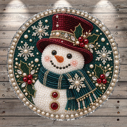 A snowman made of beads and pearls, wearing a red top hat and a green scarf, surrounded by snowflakes and holly leaves, all set against a wooden background.