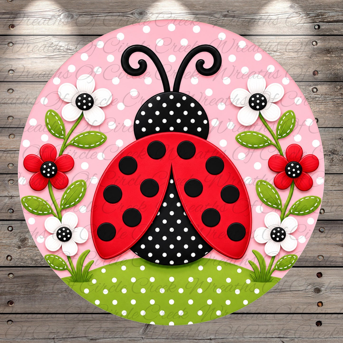 A round, decorative image featuring a red and black spotted ladybug surrounded by white flowers and green leaves, set against a pink background with white polka dots.
