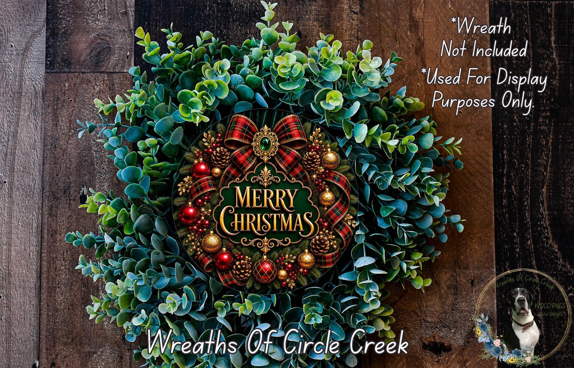 A festive Christmas wreath made of evergreen branches, adorned with red and gold ornaments and a large "Merry Christmas" sign. The wreath is displayed on a wooden surface, and there is a small dog in the bottom right corner.