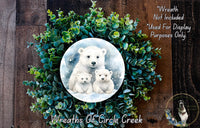 A wreath made of green leaves and a white bear image, with a caption that reads "Wreath Not Included * Used For Display Purposes Only".