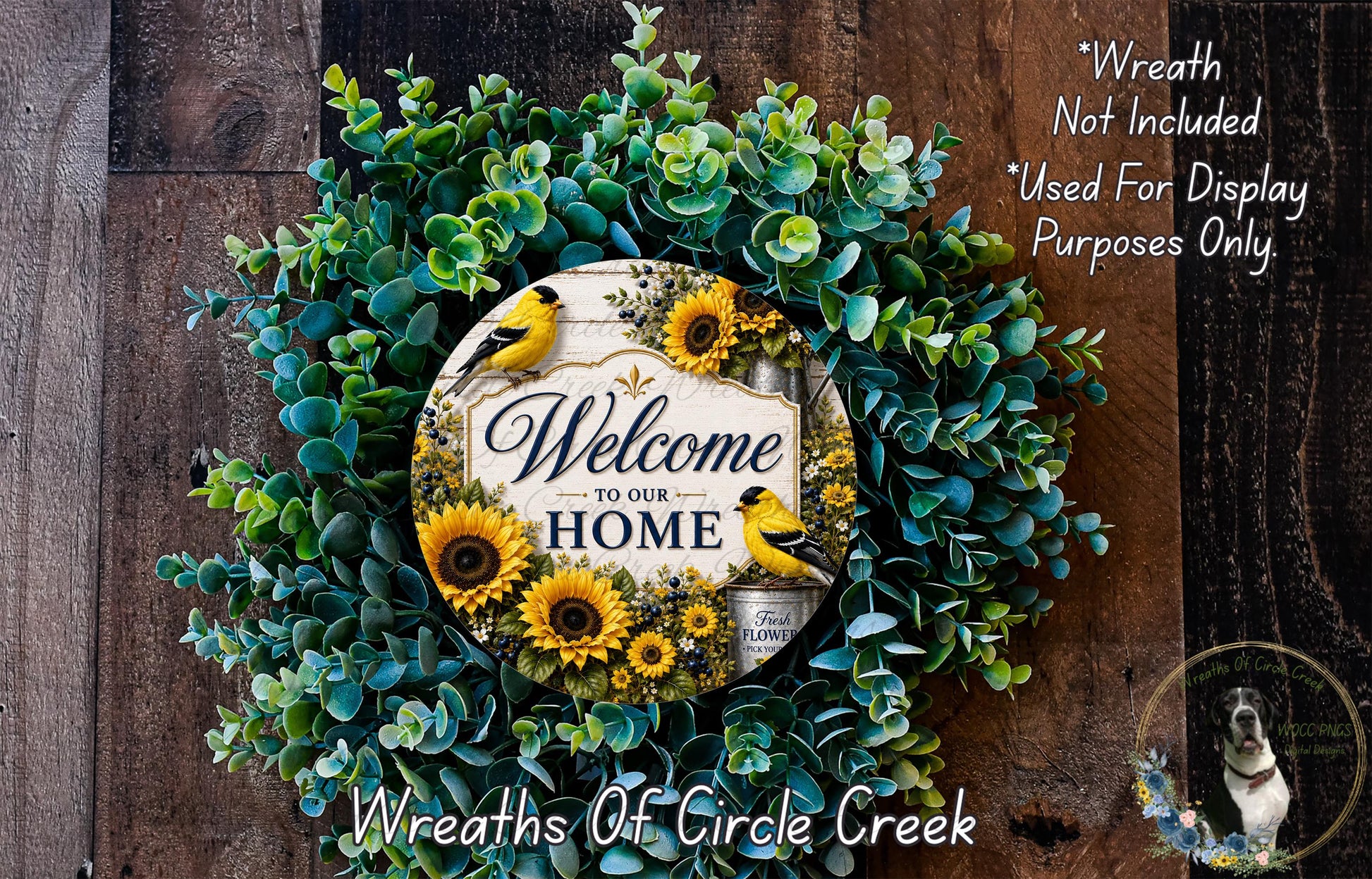 a wreath with a sign that says "Welcome to our Home" surrounded by various greenery and sunflowers.