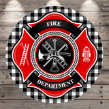 a circular emblem with a red background, black border, and white text and symbols. The emblem is designed to represent the Fire Department, with a fire hydrant, ladder, and fireman's helmet as key elements.