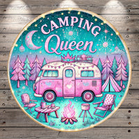 a sign that says camping queen with a camper in the background