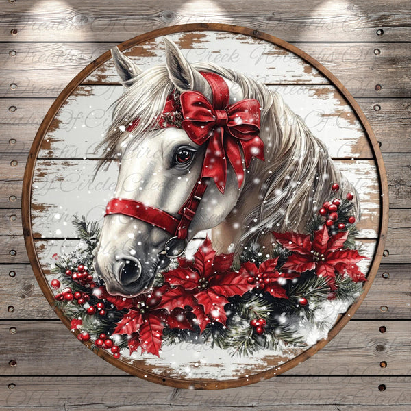 A white horse adorned with a red bow and surrounded by red poinsettia flowers and pine branches, set against a snowy background.