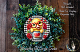 A wreath made of green leaves and red roses, with a yellow duck wearing red glasses and a red heart-shaped bucket.