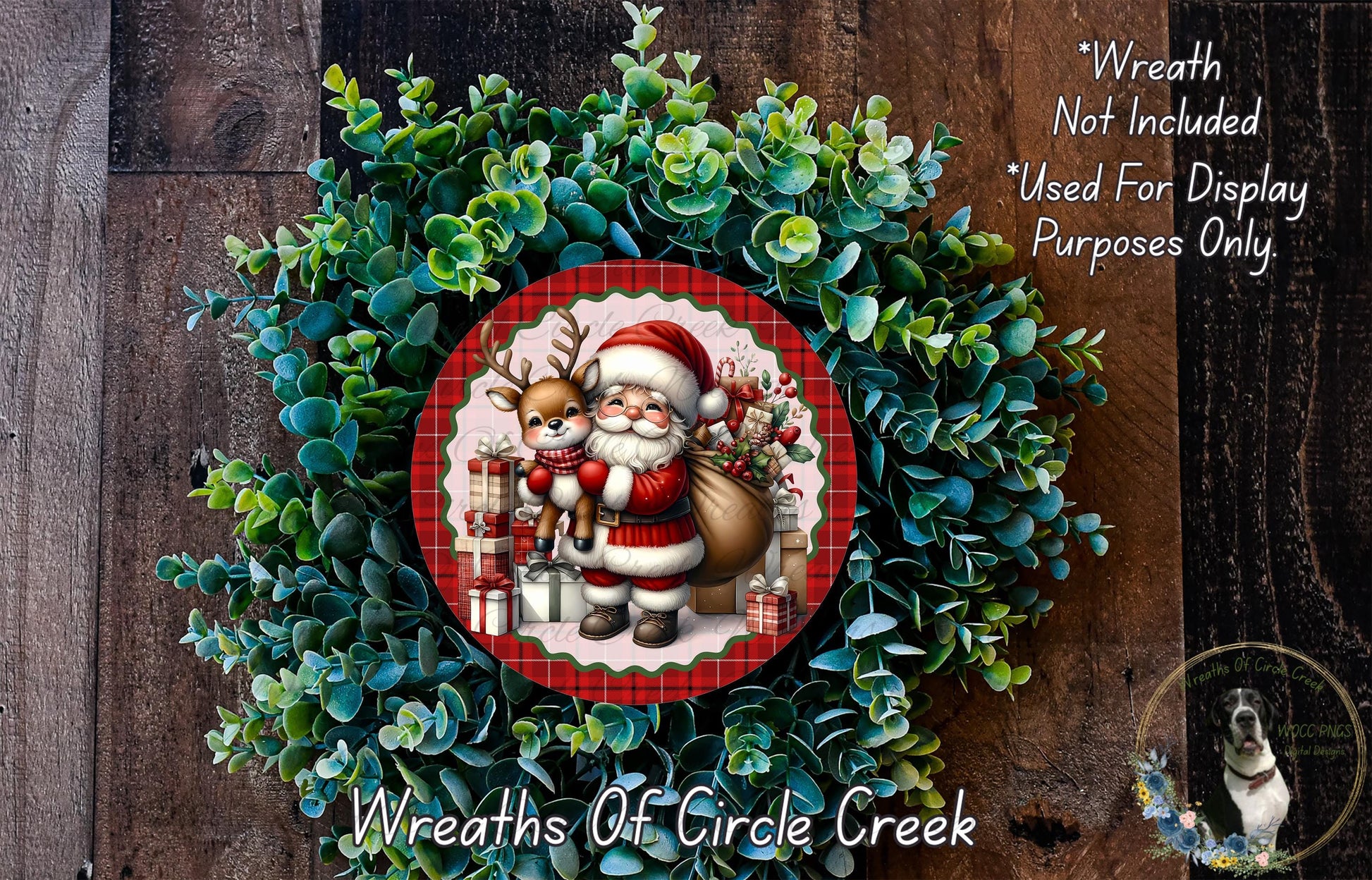 A wreath featuring a Santa Claus figure surrounded by greenery, with a red and white plaid border. The wreath is displayed on a wooden background, and there is a text overlay that reads "Wreath Not Included * Used For Display Purposes Only".