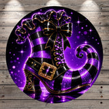 A purple and black striped witch's boot with a gold buckle, set against a starry purple background.