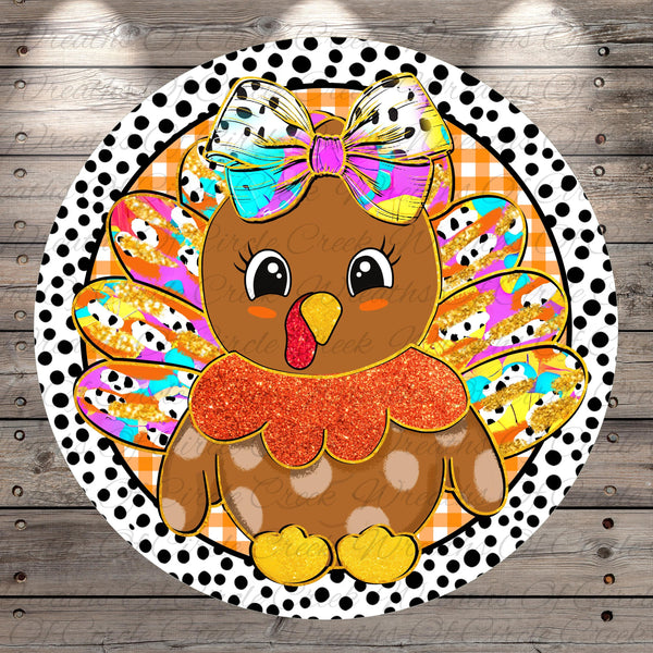 A colorful illustration of a turkey with a bow on its head, surrounded by a polka dot pattern and a wooden background.