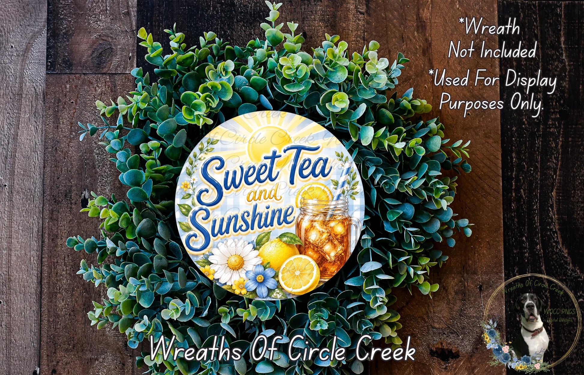 a wreath made of green leaves and flowers, with a circular sign in the center that says "Sweet Tea and Sunshine".