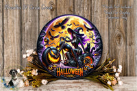 a Halloween-themed decoration with a woman riding a motorcycle, surrounded by bats, pumpkins, and flowers. The decoration is displayed on a wooden surface, and there is a text overlay that reads "Wreaths Of Circle Creek" and "HALLOWEEN COMING".