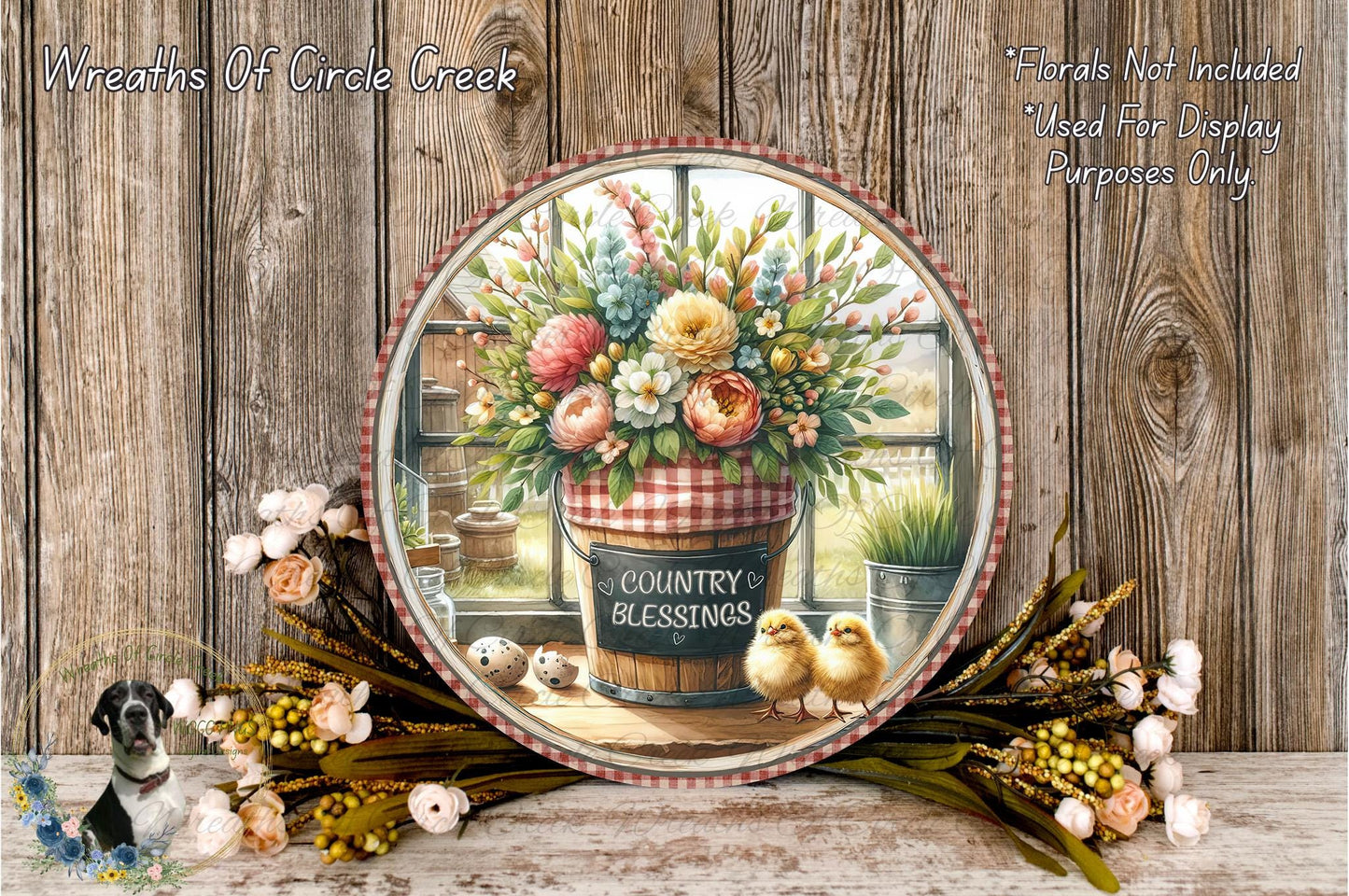a round mirror with a floral arrangement inside, surrounded by a rustic wooden background and a wreath of flowers.