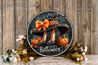 A Halloween-themed wreath with a witch's hat, pumpkins, and flowers, along with the text "Happy Halloween" displayed on a wooden background.