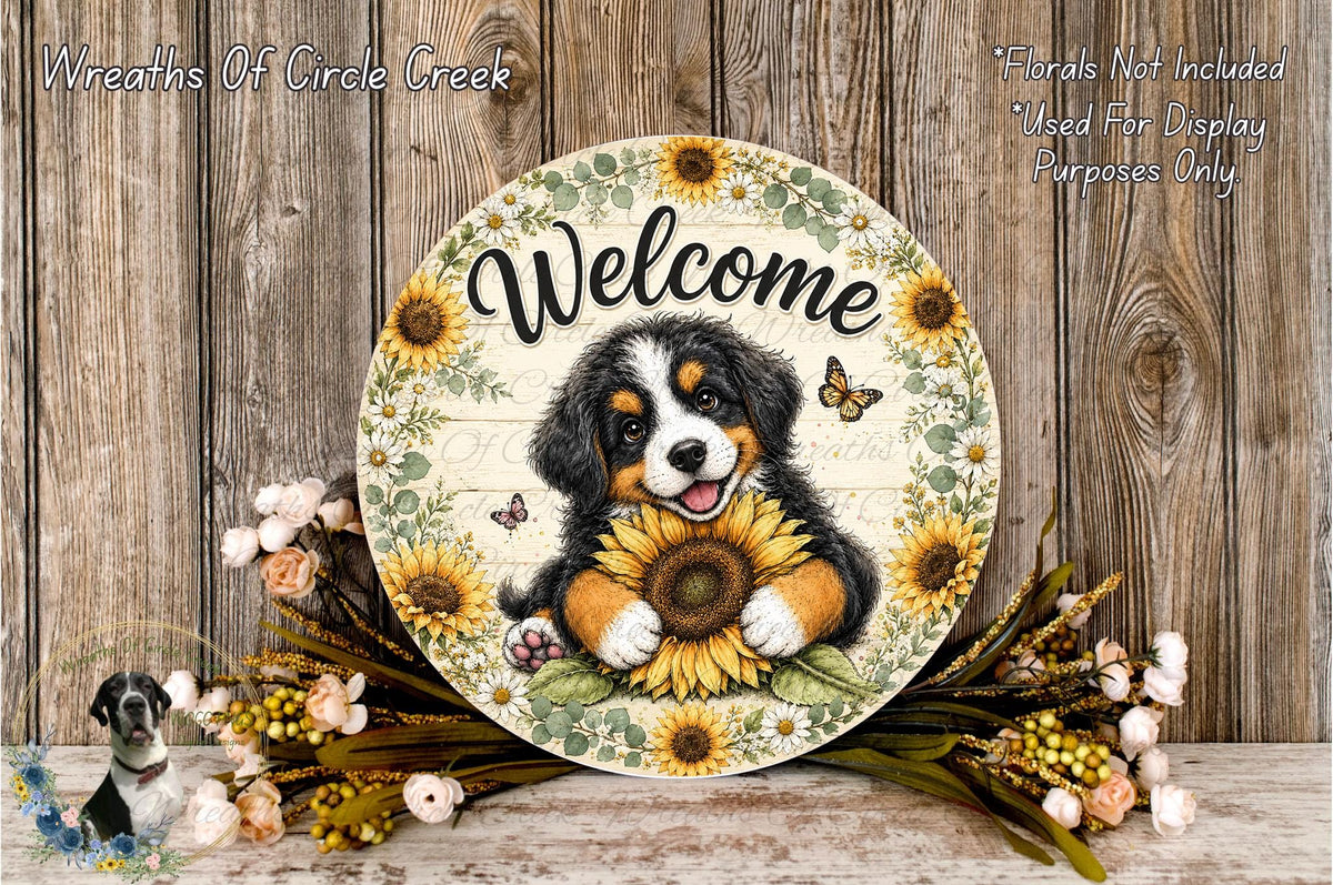 A decorative sign featuring a dog holding a sunflower, surrounded by flowers and a wooden background.