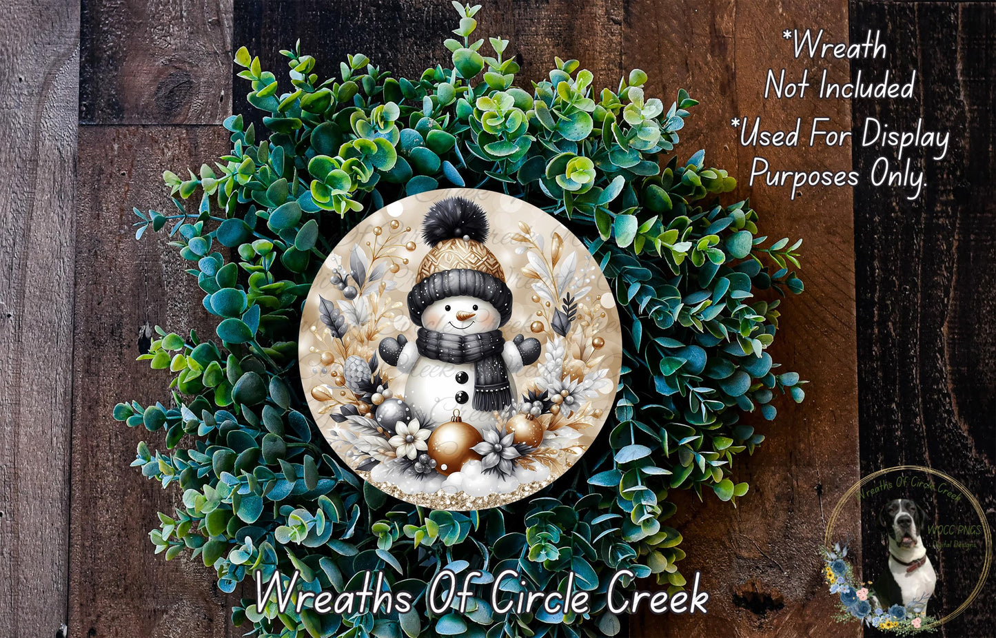 A wreath made of green foliage and featuring a snowman as the central decorative element.