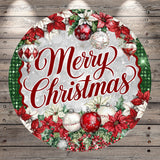 A circular Christmas wreath with the text &quot;Merry Christmas&quot; written in a decorative cursive font. The wreath is adorned with red poinsettias, white ornaments, and other festive decorations.