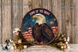 a patriotic design with an eagle and American flags, surrounded by flowers and a wooden background.