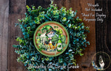 A wreath made of green leaves and featuring a gnome holding a beer bottle, with the text "Happy St. Patrick's Day" and "Wreaths of Circle Creek" displayed.