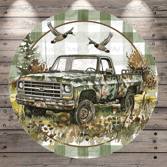 A camouflage truck is depicted in a wooded area, with two ducks flying above it.
