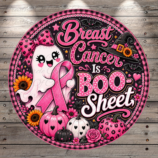The image is a vibrant and colorful illustration featuring a ghost, pumpkins, flowers, and a pink ribbon, all set against a black and white background.