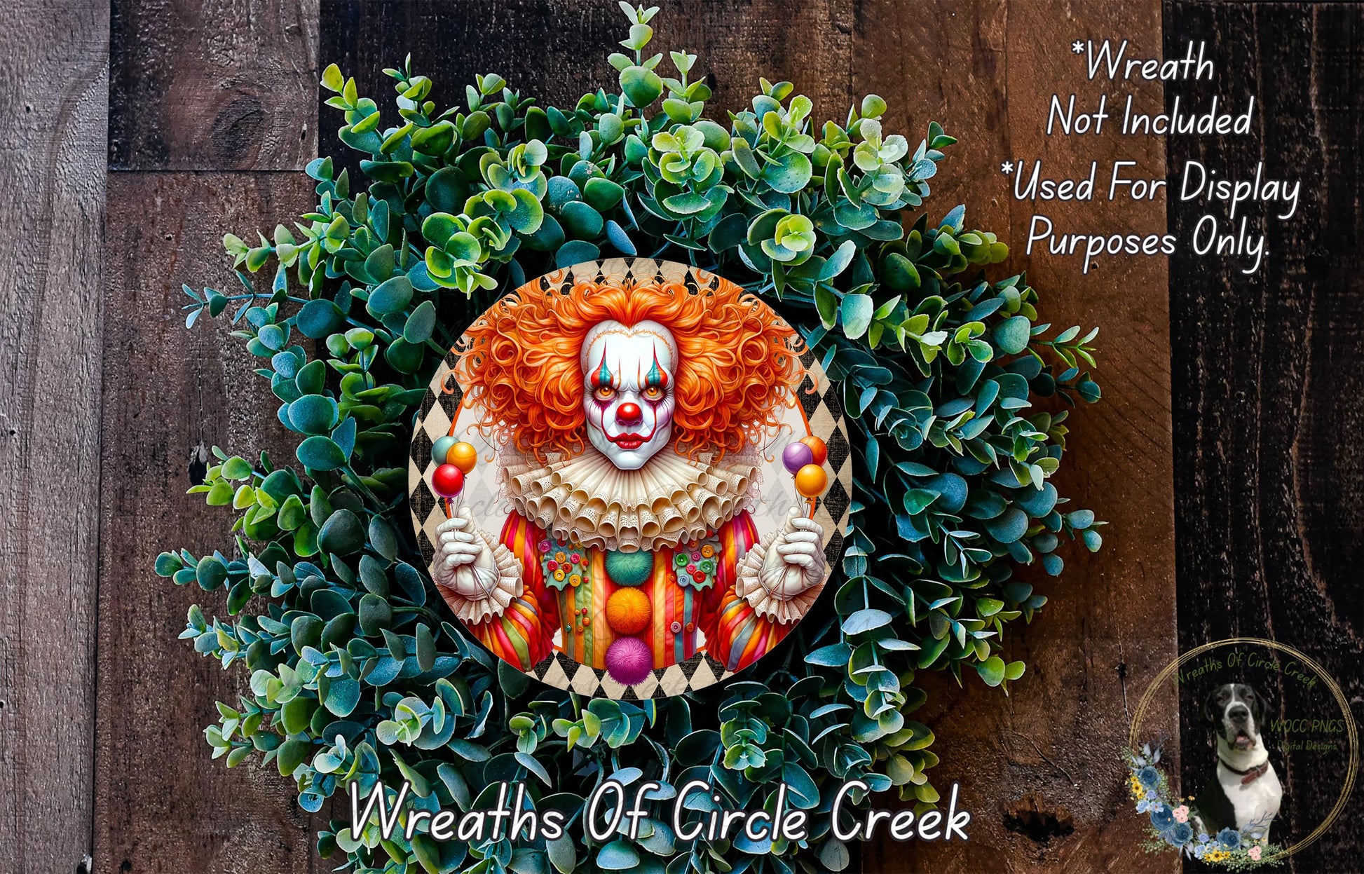 A wreath featuring a clown face surrounded by greenery, with a wooden background.