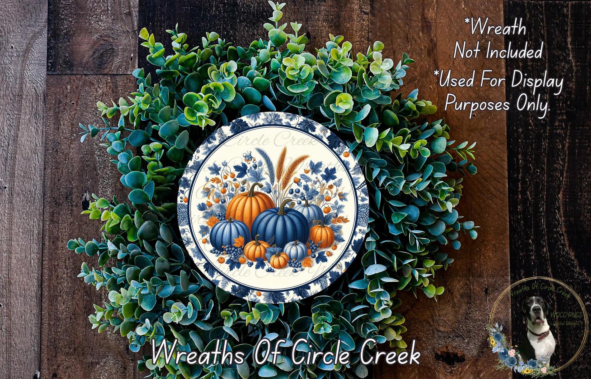 a wreath with a picture of pumpkins on it