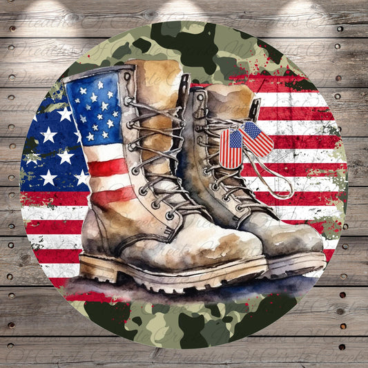 A pair of worn combat boots with American flag motifs, set against a camouflage background, is depicted in the image.