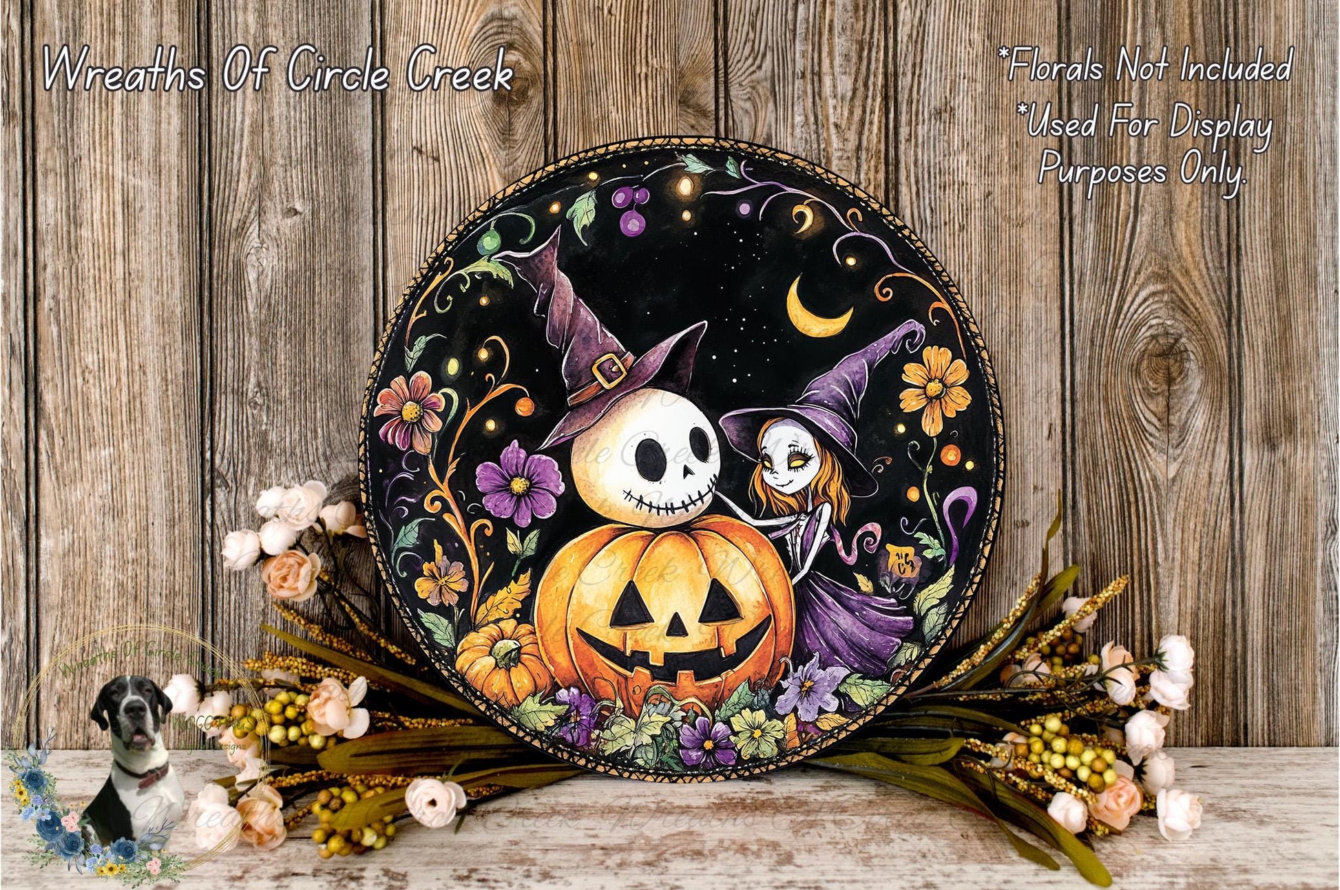 a Halloween-themed wreath with a jack-o-lantern and a skeleton, surrounded by flowers and a wooden background.