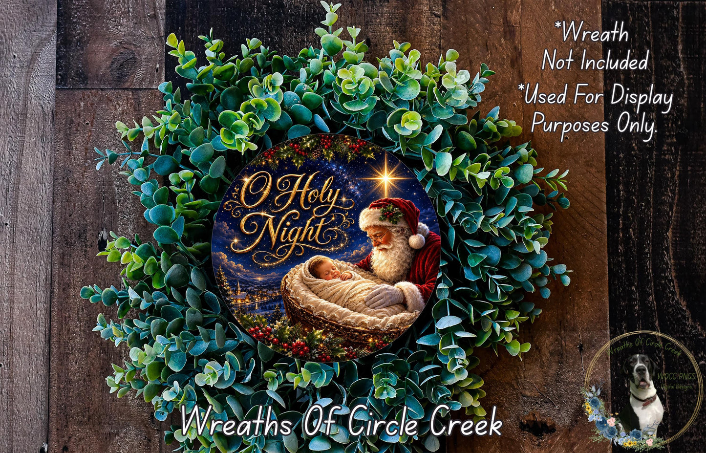 A wreath with a Santa Claus figure and a baby in a basket, surrounded by greenery, with the text "O Holy Night" and "Wreaths of Circle Creek" displayed.