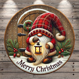 A gnome holding a lantern and surrounded by Christmas decorations, including a wreath and berries, with the text "Merry Christmas" displayed.