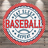a circular design with the text "EAT SLEEP BASEBALL REPEAT" in a bold, red font. The design is set against a wooden background with a polka dot border.