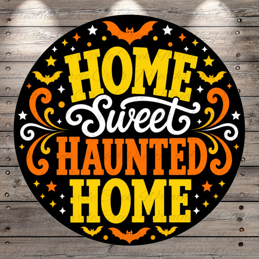 a circular graphic with the text "HOME Sweet Haunted Home" in a decorative, stylized font.