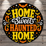 a circular graphic with the text "HOME Sweet Haunted Home" in a decorative, stylized font.