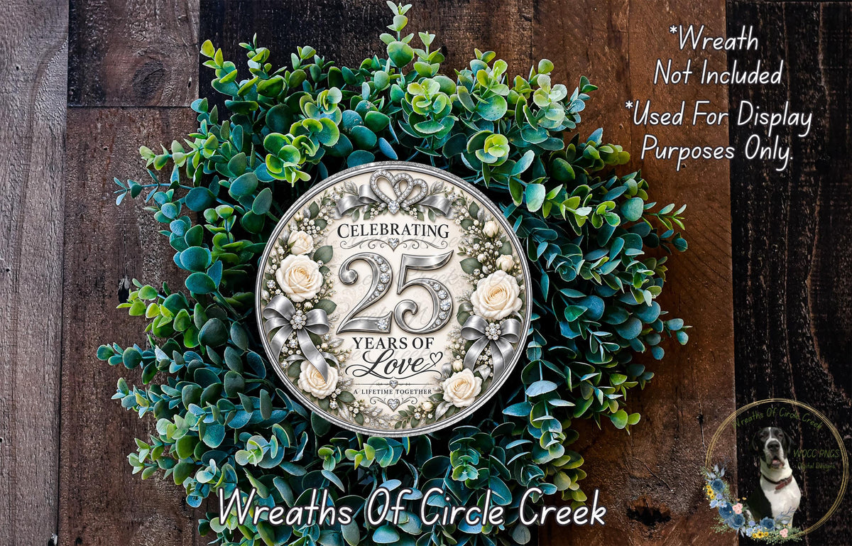A wreath made of green leaves and flowers, with a circular plaque in the center that reads "Celebrating 25 Years of Love" and "A Lifetime Together".